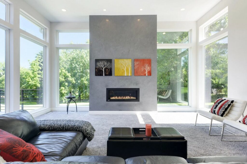Living Room with Expansive Windows and a Fireplace