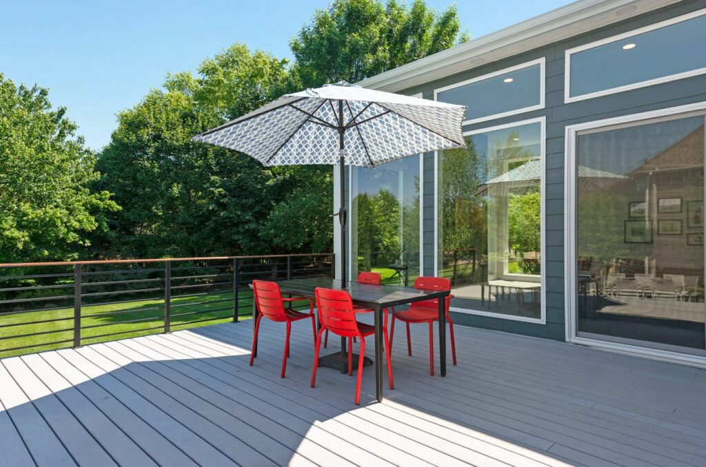 Red Chairs and Umbrella on a Deck