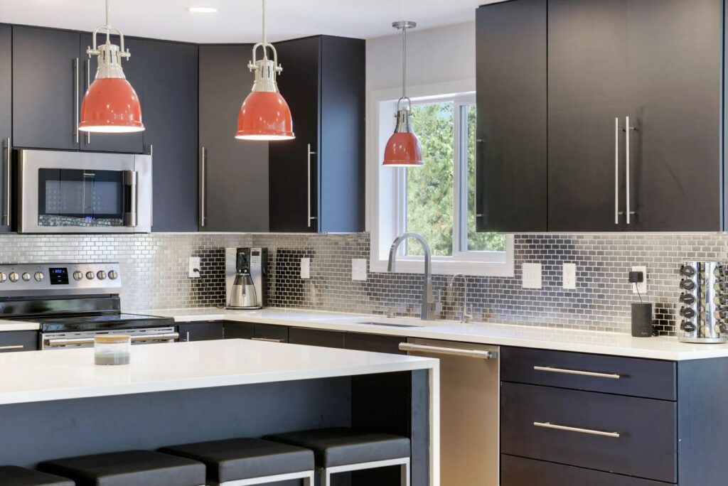 A Kitchen Black Cabinets and Counter Tops